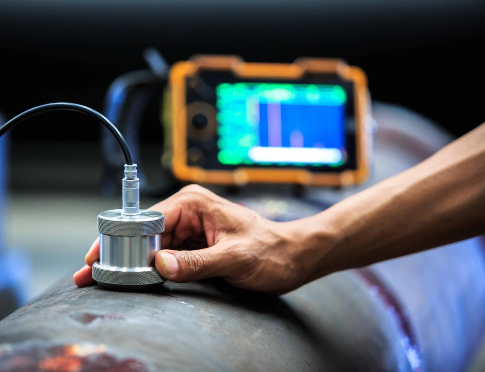 An NDT technician using specialist equipment.