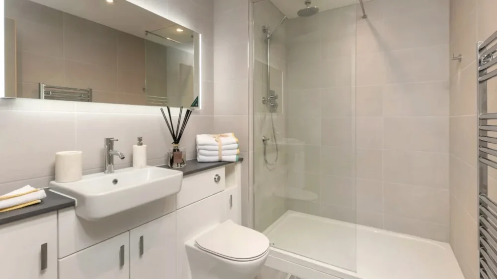 A minimalist white bathroom.